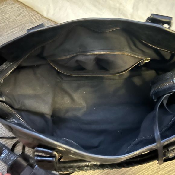 Black gently used Balenciaga purse. Only worn a few times. In great condition. - Picture 2 of 4